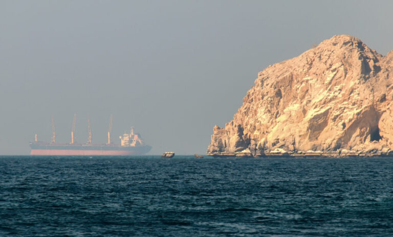 Oil prices settle up as Iran says Strait of Hormuz to stay shut